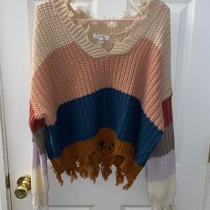 colorful distressed v neck sweater